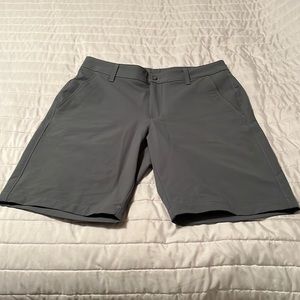 Under Armour golf shorts.